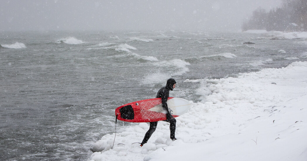 Surf’s Up. The Temperature Isn’t. - The New York Times